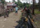 Antisipasi Banjir, TNI dan Warga Kompak Bersihkan Saluran Drainase di Desa Nepo