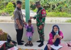 Bangun generasi sehat didesa lariang,  Babinsa Koramil 1427-01/Pasangkayu  Terlibat langsung dalam kegiatan posyandu.